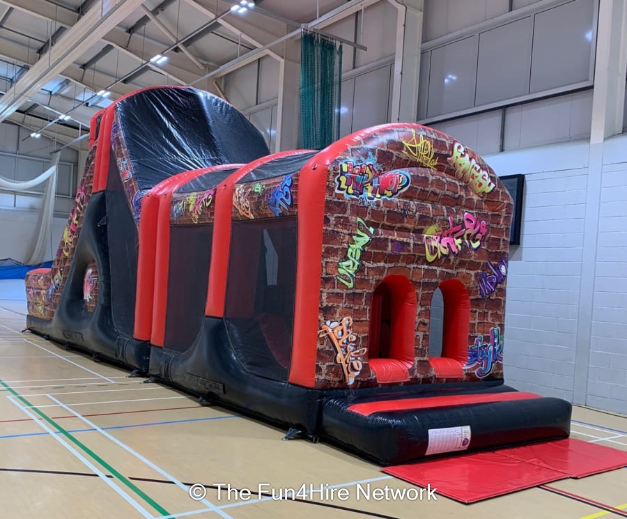 Graffiti Obstacle Course with 10ft MEGA Slide - Bouncy Castle Hire ...