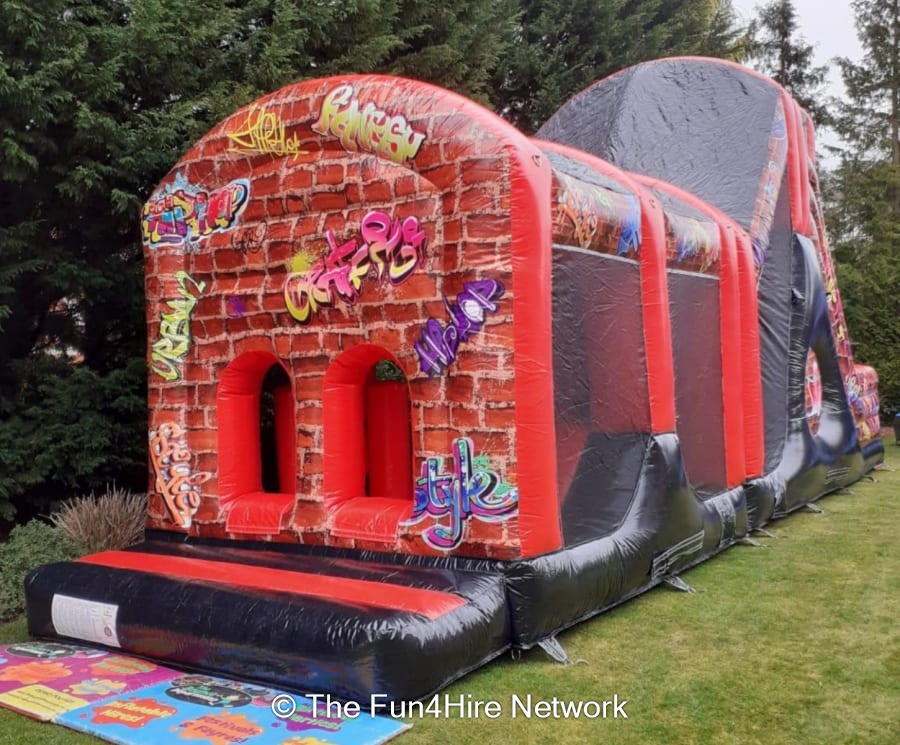 Graffiti Obstacle Course with 10ft MEGA Slide - Bouncy Castle Hire ...